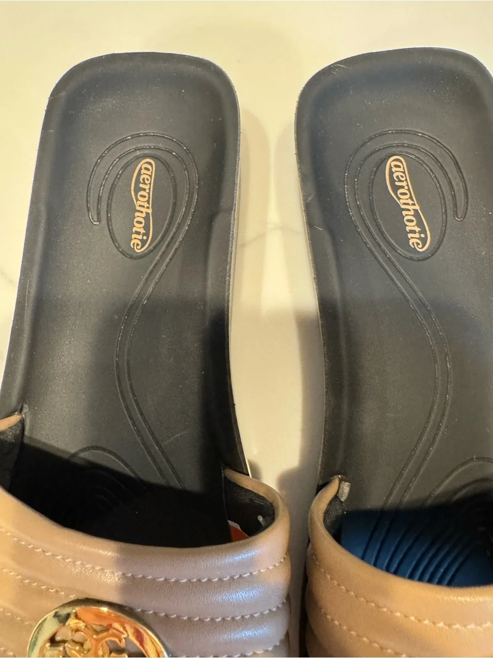 Aerothotic Tan Slide Sandals with Gold Emblem NWOT